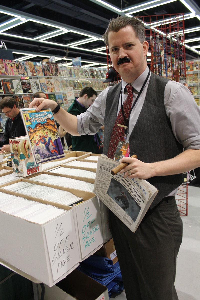 JJJ Holding a Comic